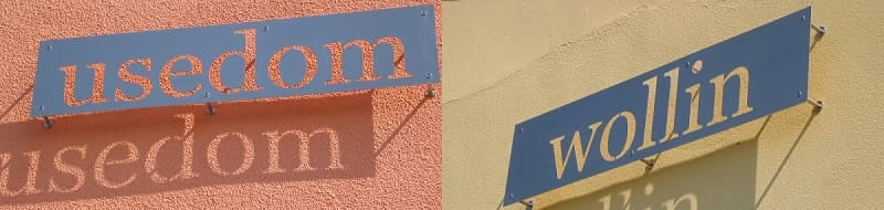 Metallschilder beschriftet mit "Usedom" und "Wollin"